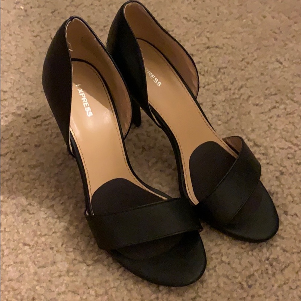 Black worn express heels